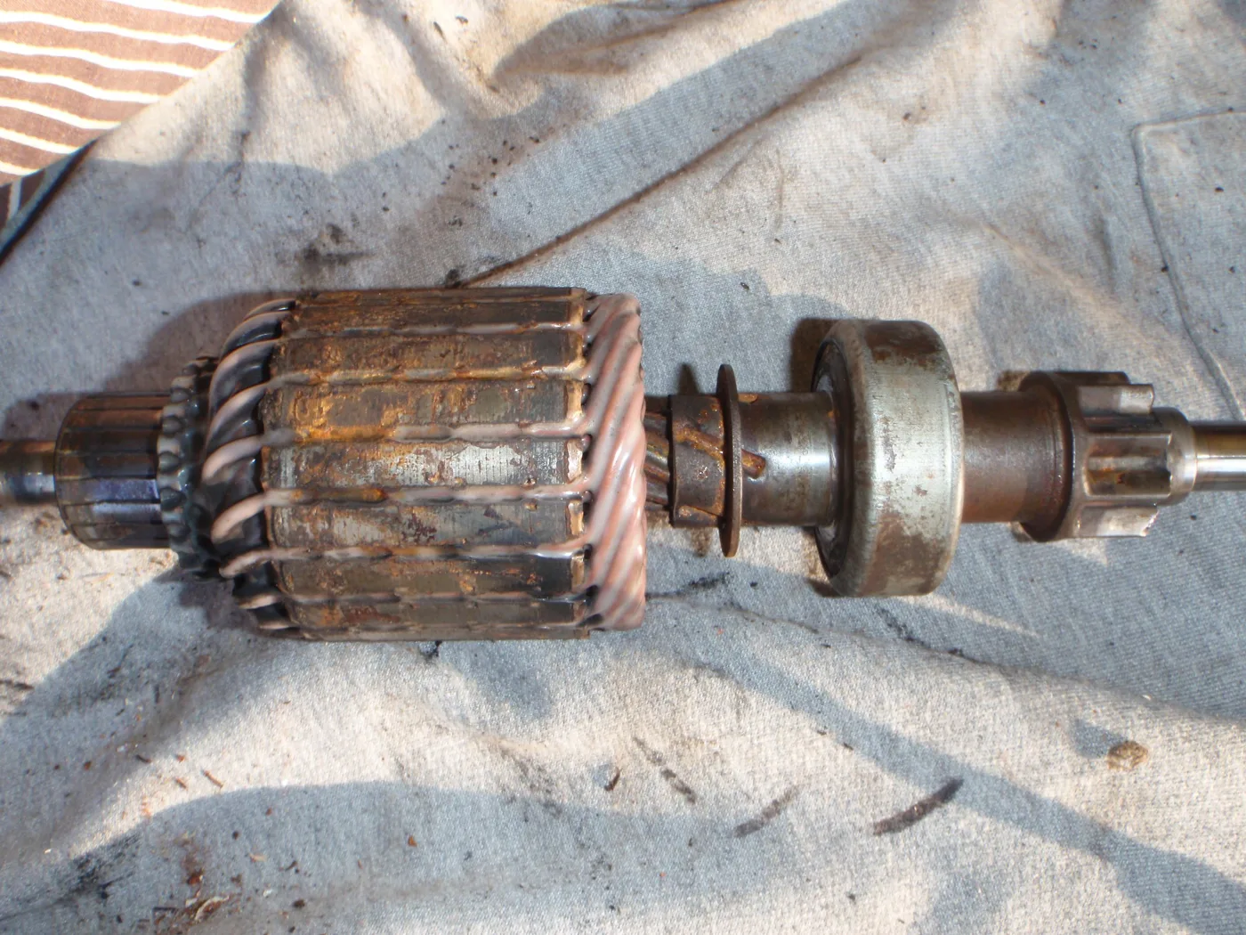Rotor củ đề xe tải mòn cổ góp